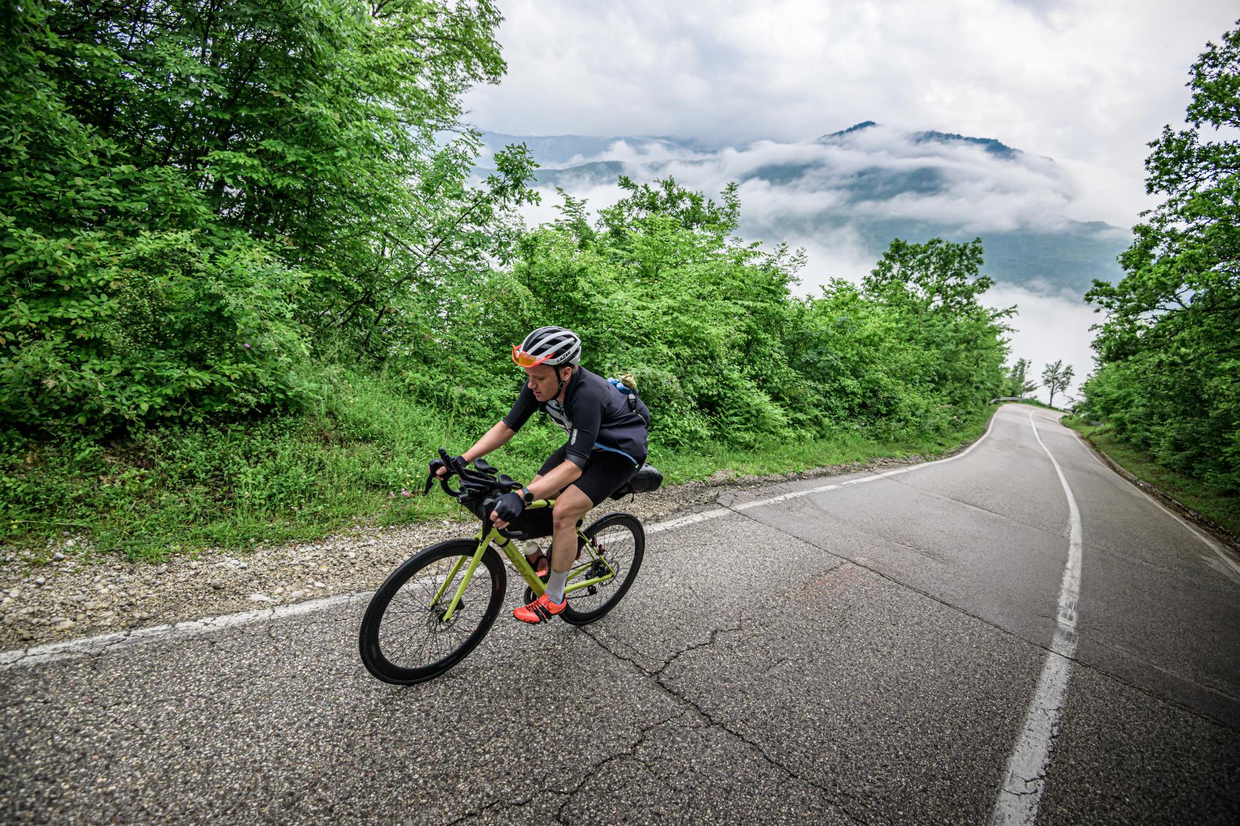 cyclist climbing up a hill in Bosnia and Herzegovina